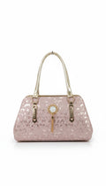 Bmart barihat pink glitter handbag with gold metallic handles and a central decorative pearl and tassel charm